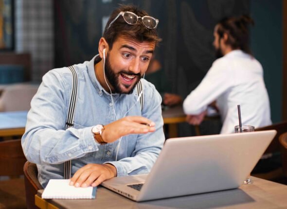 Man have business meeting via video call in a cafe