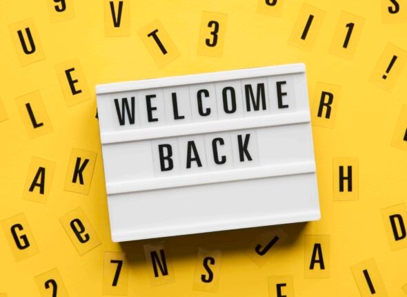 Welcome back lightbox message on a bright yellow background